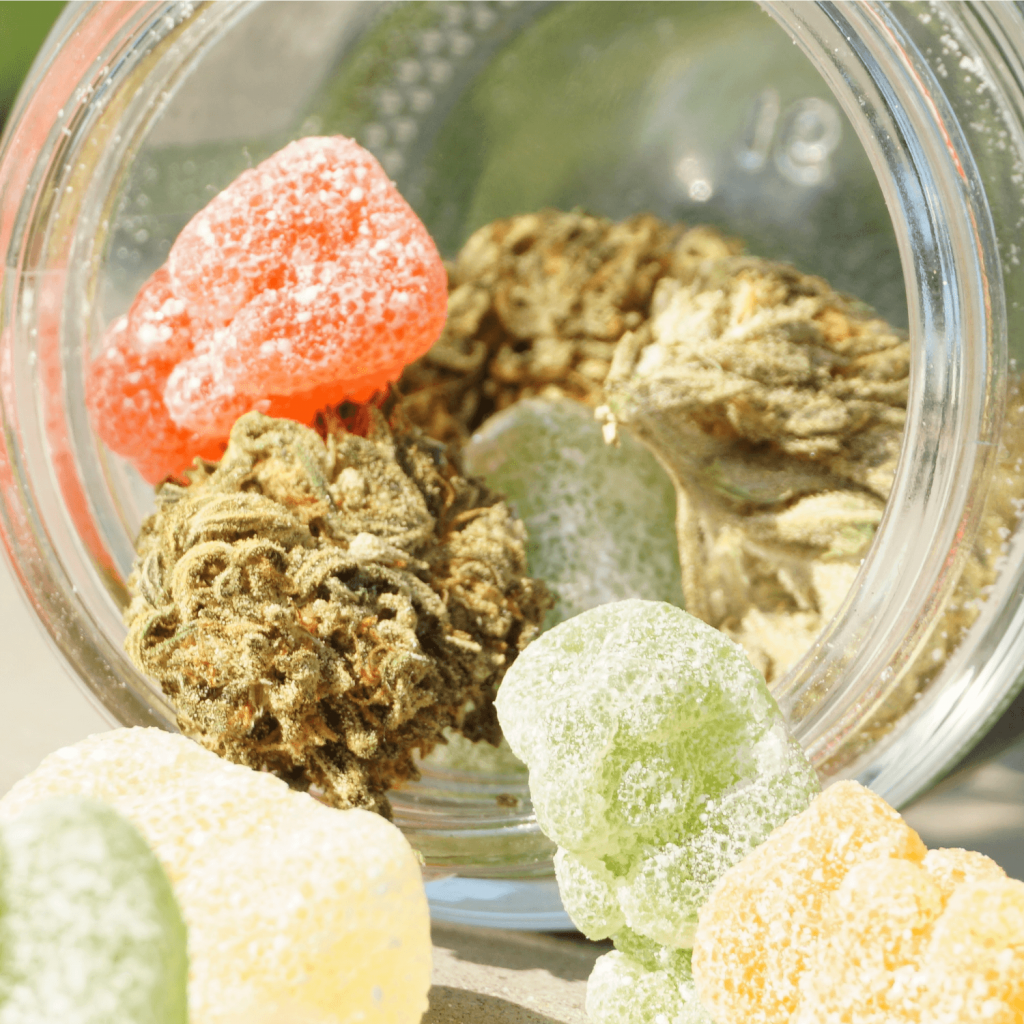 Cannabis edibles and nugs spilling from a jar