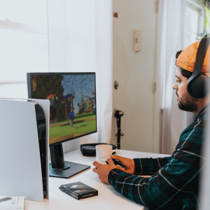 A man calmly playing video games