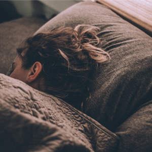 A woman sleeping in bed