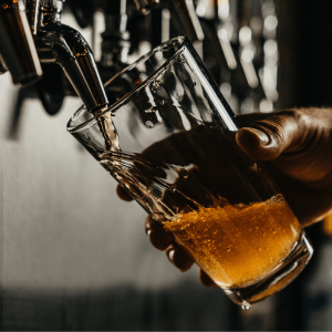 Beer pouring from a tap