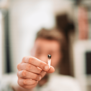 a person passing a joint