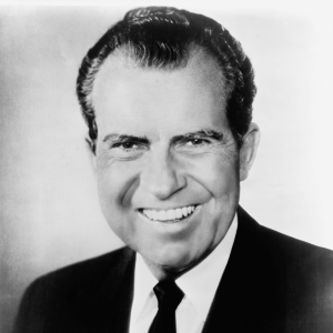 a black and white photo of President Richard Nixon
