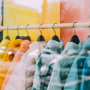 Coats hanging in a shop window