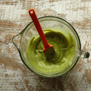 a green smoothie in a blender