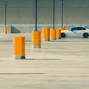 a white car parked in a parking lot