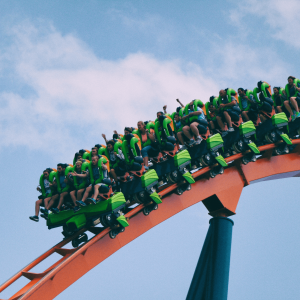 people riding a roller coaster