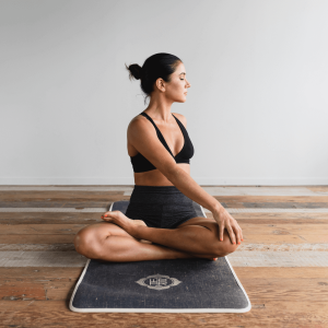 a woman practicing yoga