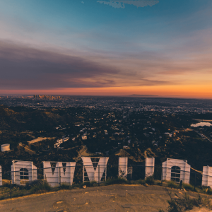 The view of Los Angeles California behind the hollywood sign at sunset