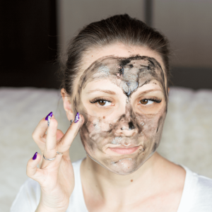 a woman with a face mask on