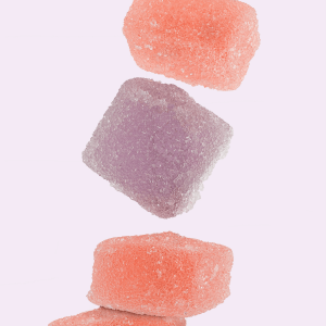 pink and purple gummies coated in sugar