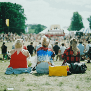 people watching a show in a field