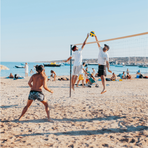 people playing beach volleyball