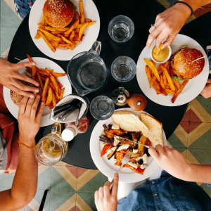 aerial view of people eating at a restaurant table