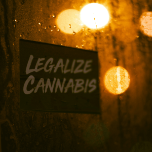 a sign saying ‘legalize cannabis’