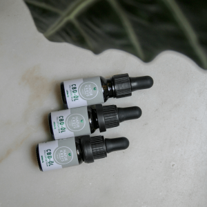 three bottles of CBD oil