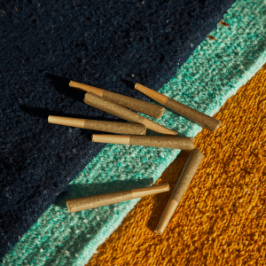 rolled joints on colorful carpet