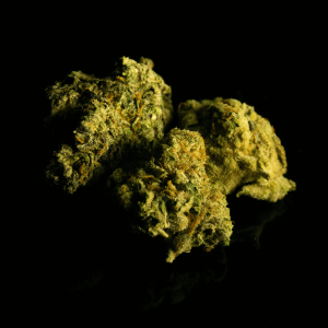 green kush against black background