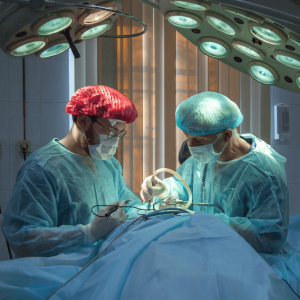 doctors in the operating room performing surgery