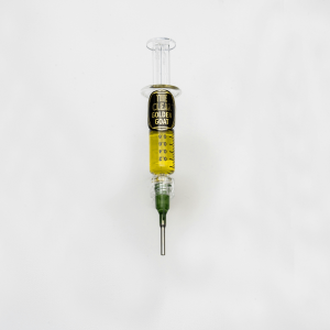 gold oil in syringe