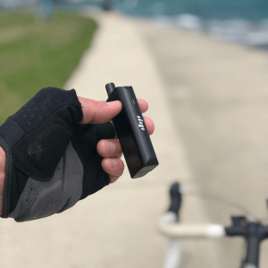 hand holding black weed vape