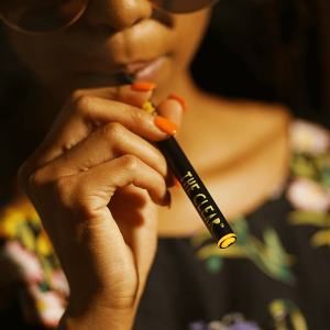 woman hitting weed pen